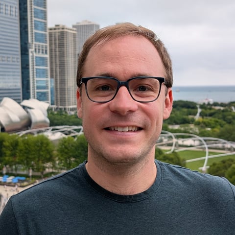 Headshot of Aaron J Smith